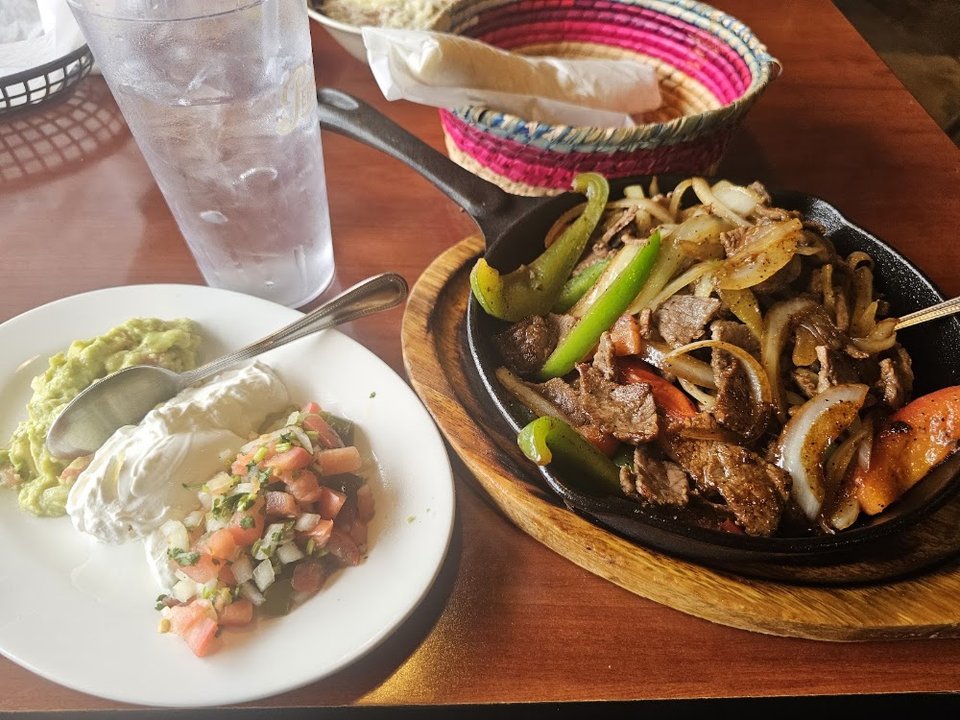 Menu page showing burritos, enchiladas, and desserts.