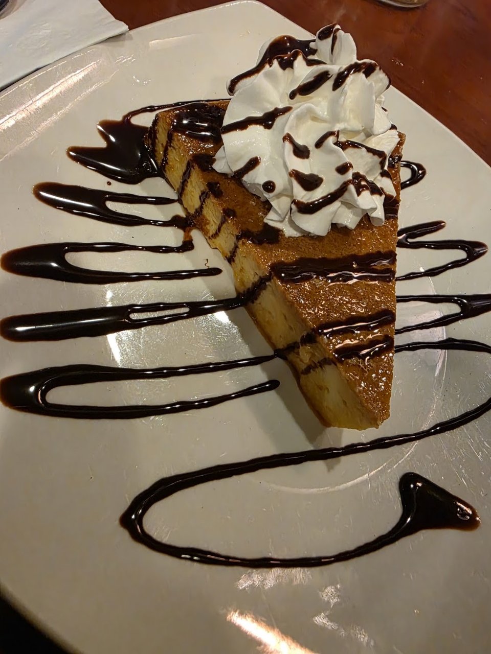 Dessert and burrito selections laid out on a menu.